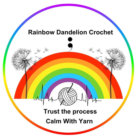 a rainbow with blown dandelions either side, a semi-colon in the middle and a ball of yarn with a crochet hook